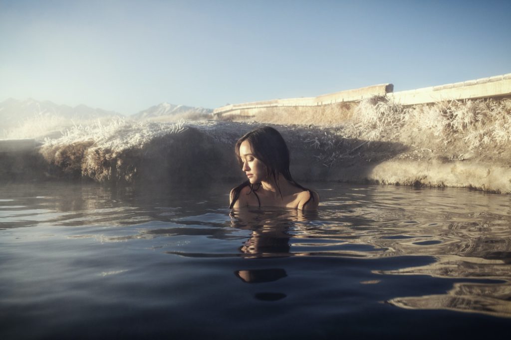 Woman Relaxing In Hot Springs