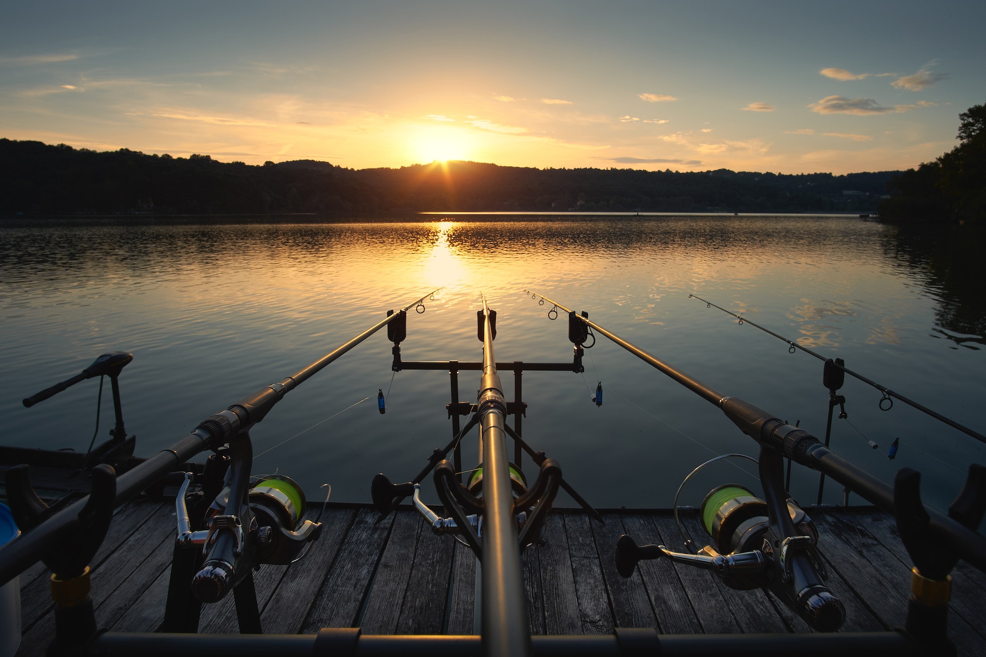 Fishing rods at sunset