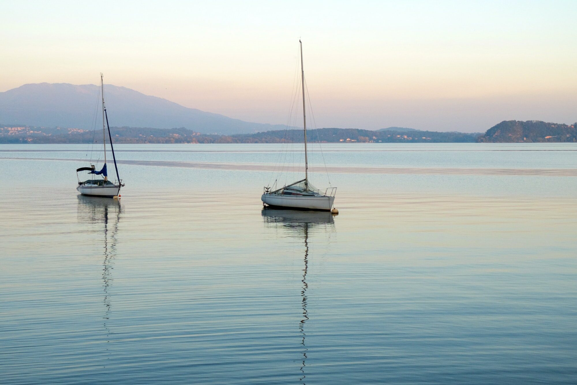 Sailboats in lake Maggiore (Italy) - sunset