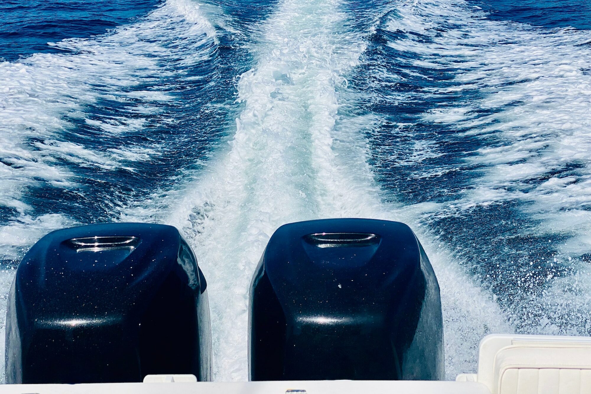 The wake of a speed boat yacht in the open Pacific