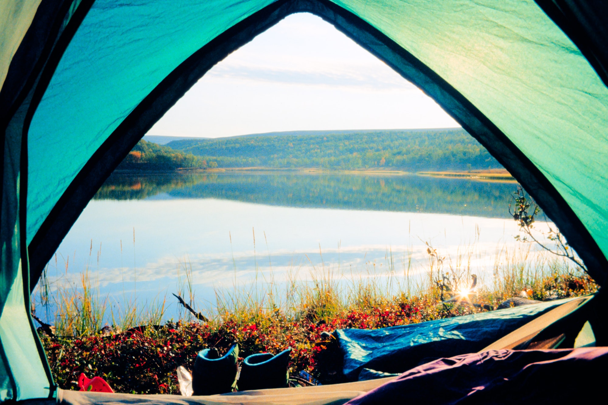Beautiful calm lake tent view camping