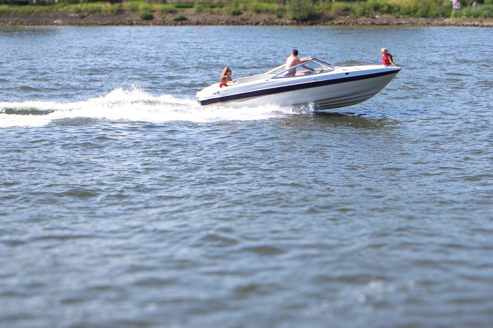 Family fun on the water with the speed boat.