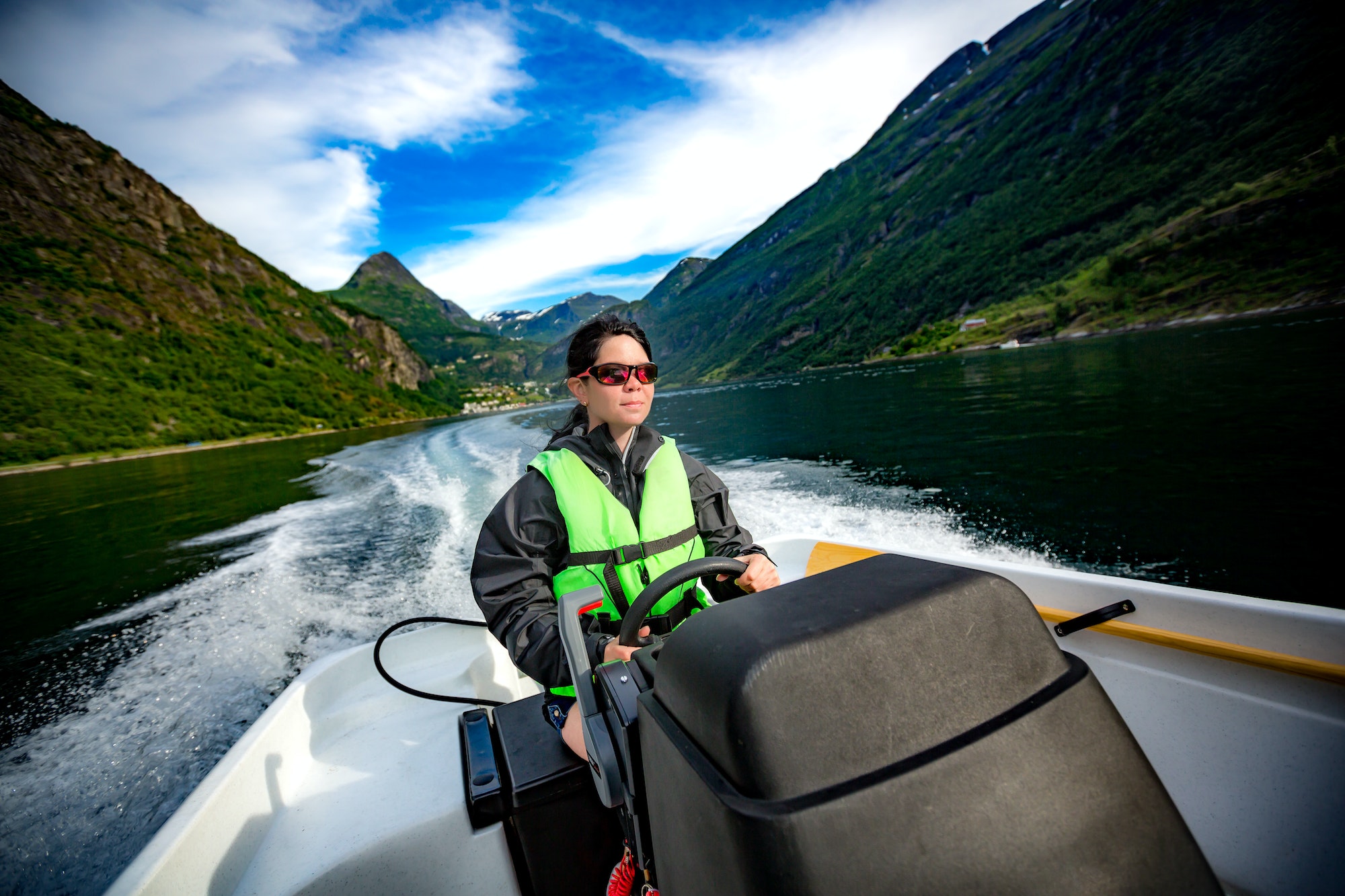 Woman driving a motor boat