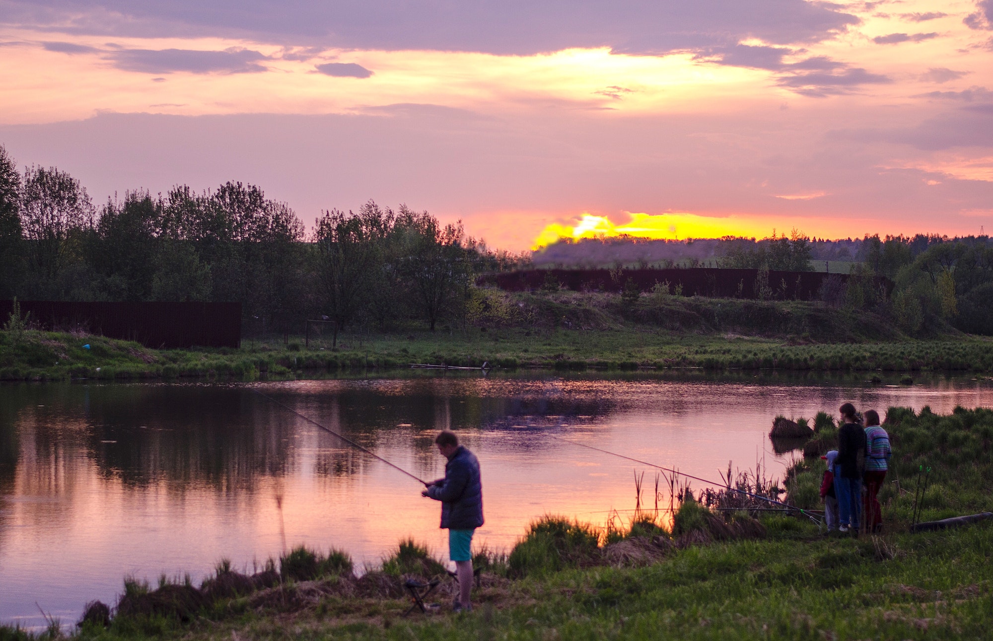 Lake fishing sunset